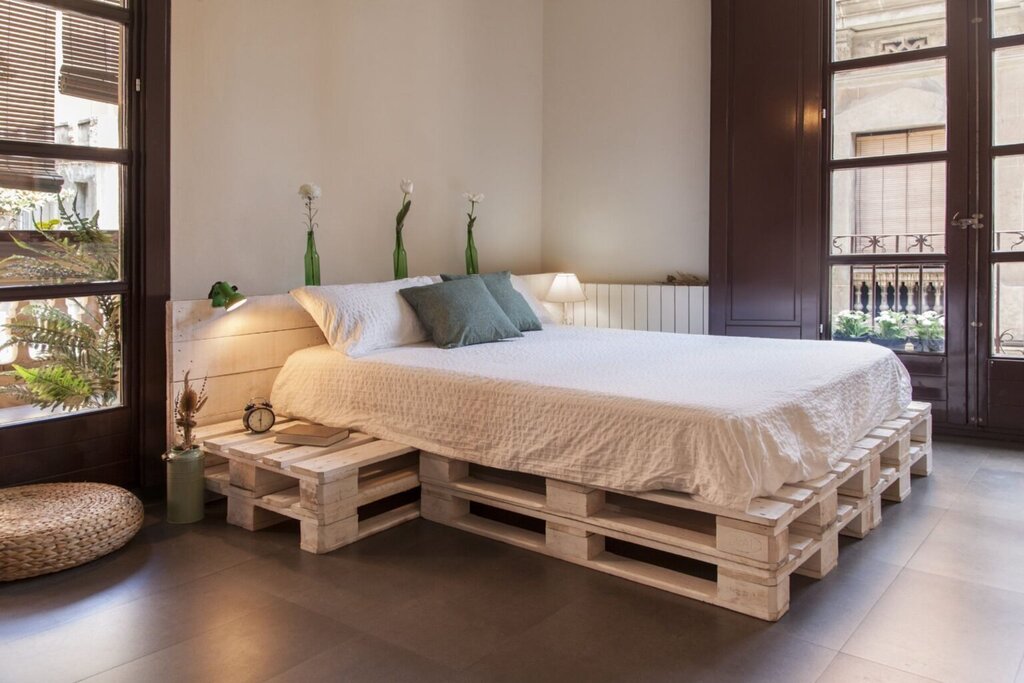 A mattress on pallets in the interior