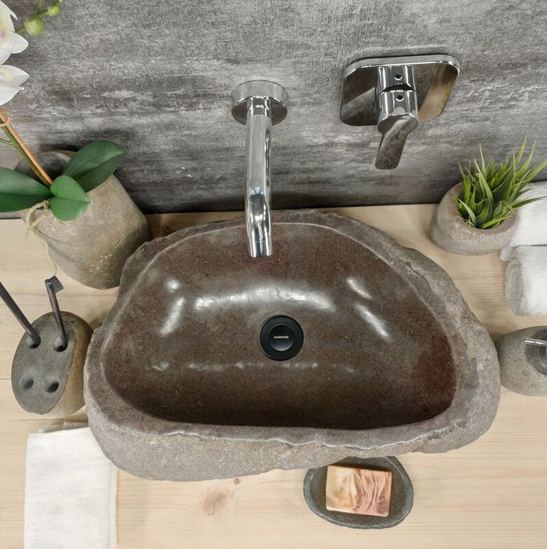 A kitchen sink made of natural stone