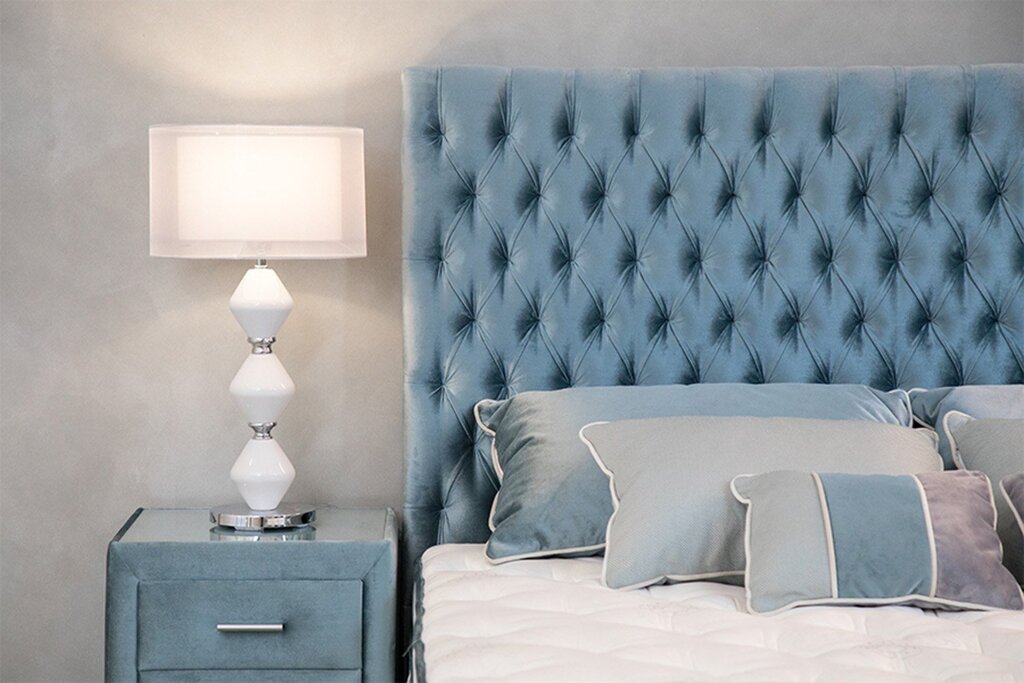 Soft upholstery for the wall above the bed