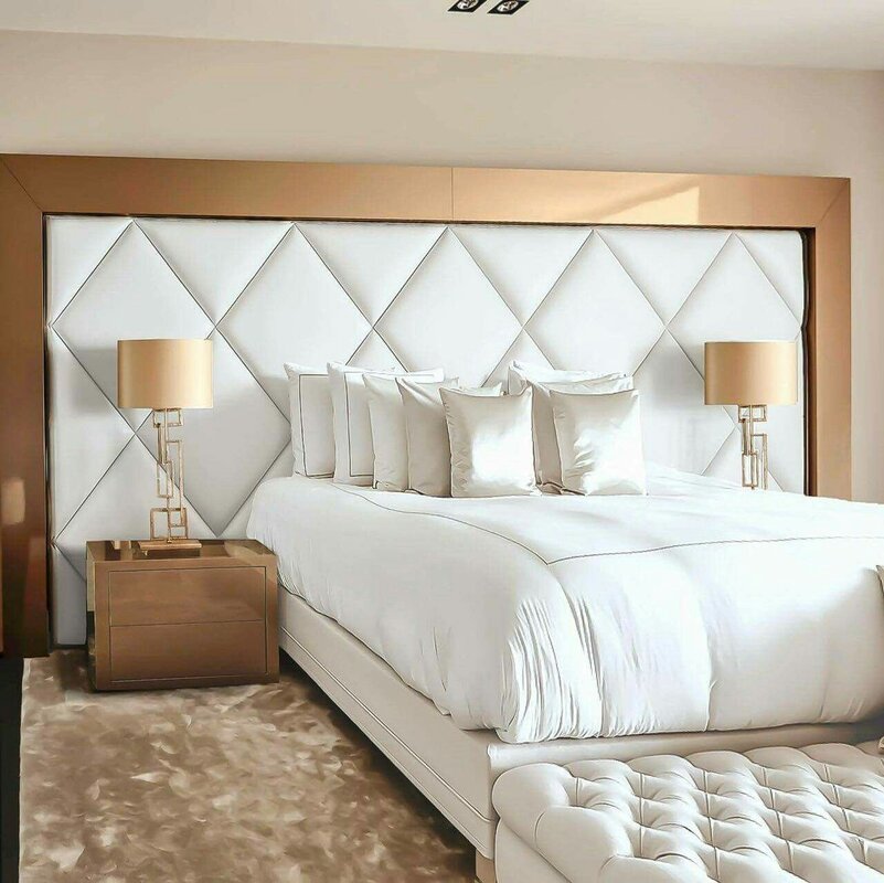 Soft panels at the head of the bed