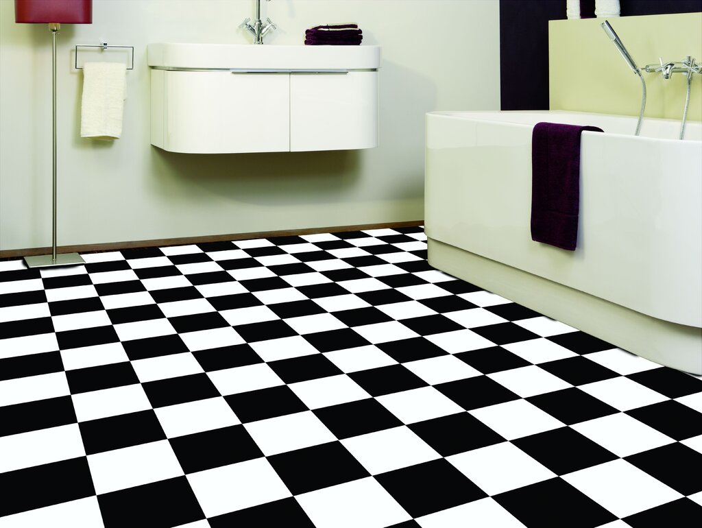 White floor tile with black squares