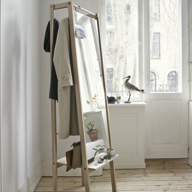 Floor mirror with a clothes rack