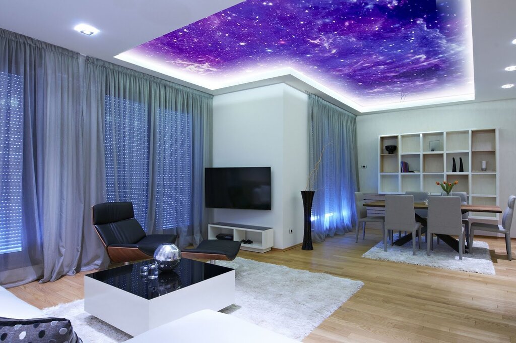 Stretch ceilings with lighting in the living room