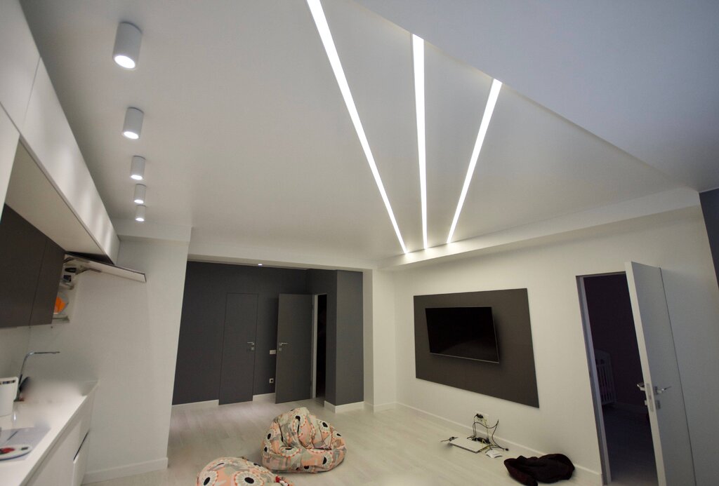 Stretch ceilings with light strips