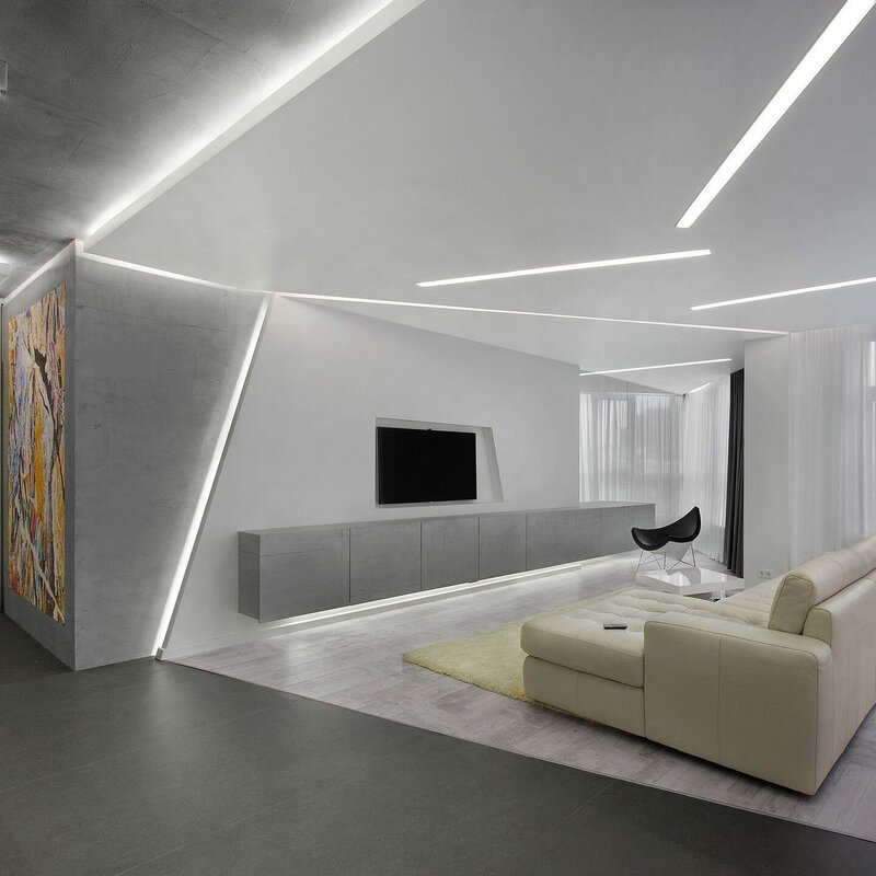 Stretch ceiling on the wall with lighting