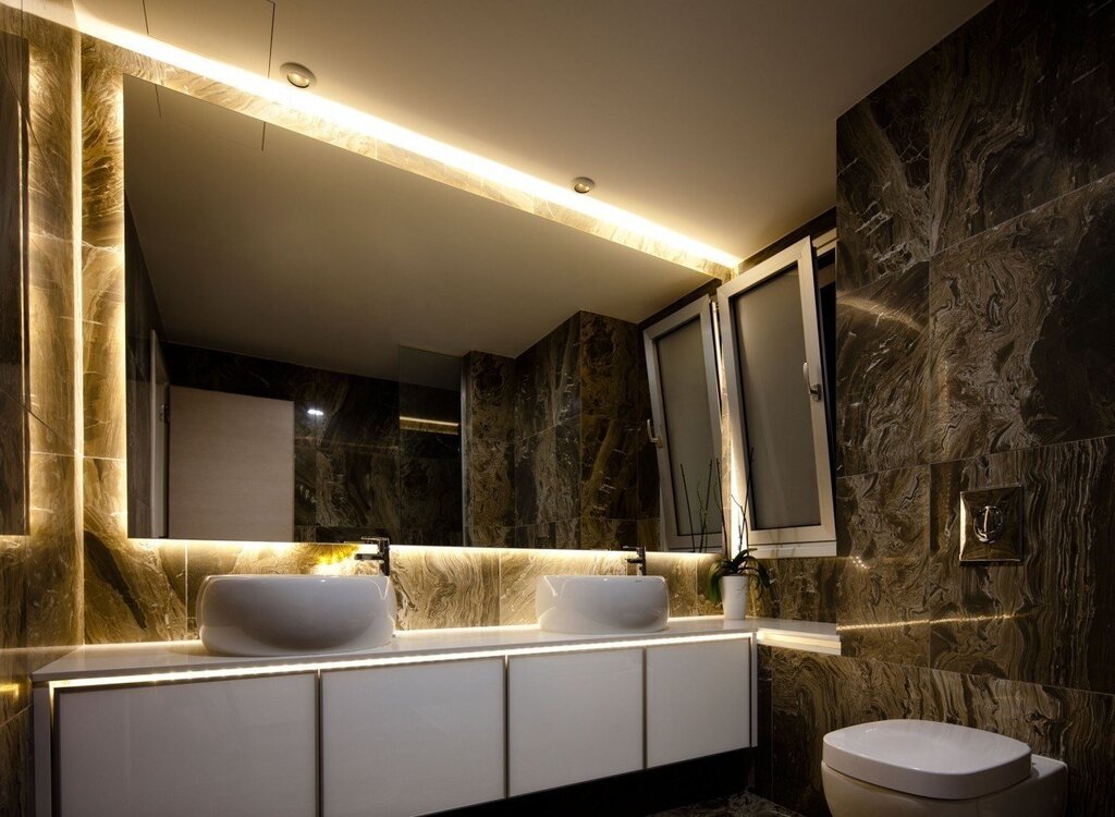 Stretch ceiling with a marble finish in the bathroom