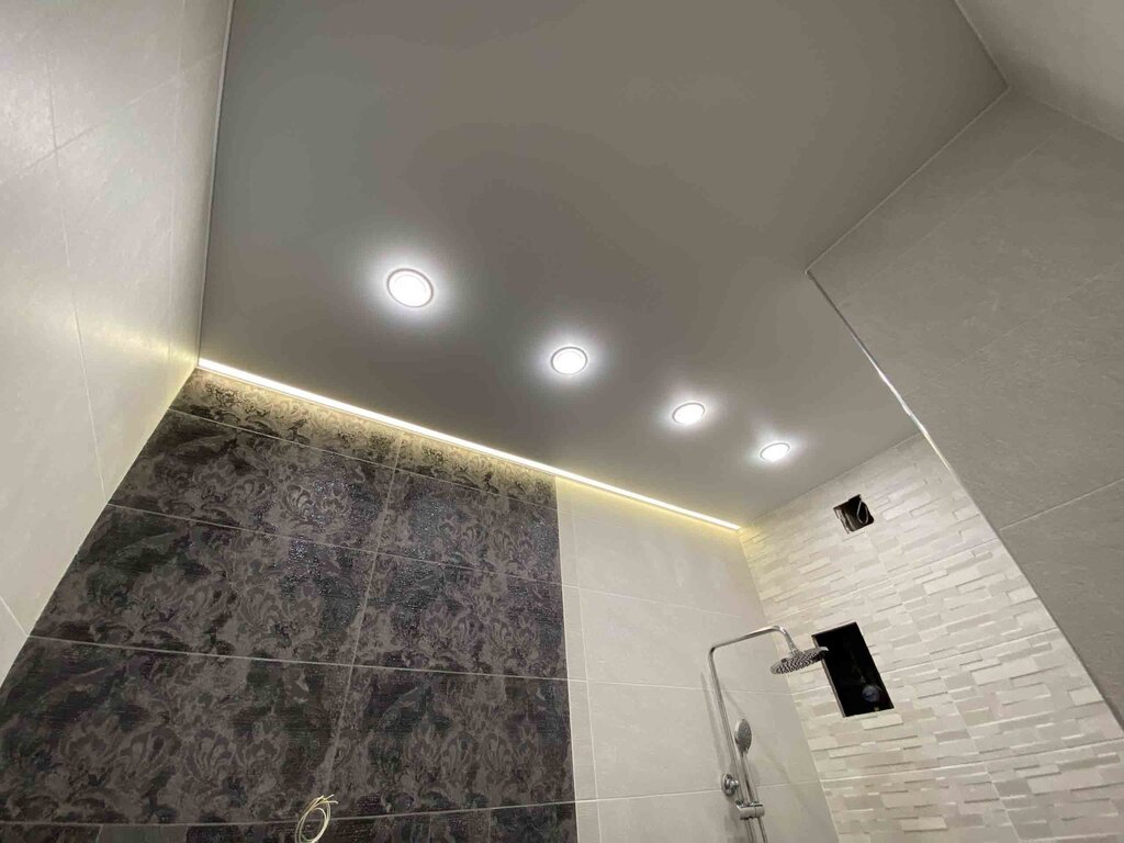 Stretch ceiling with lighting in the toilet