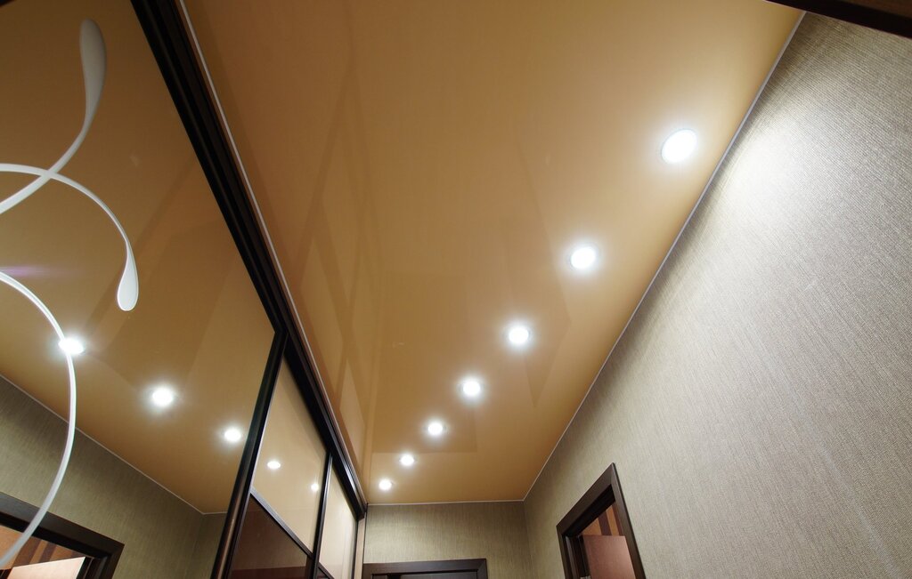 Stretch ceiling in the hallway with lighting