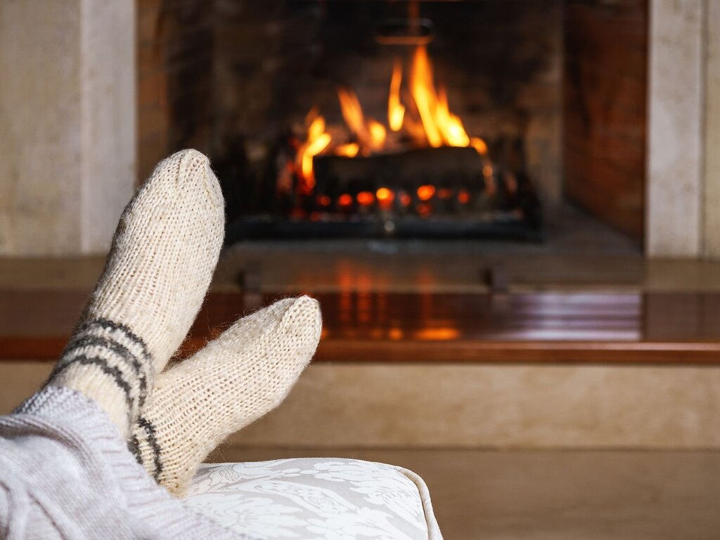 Feet by the fireplace