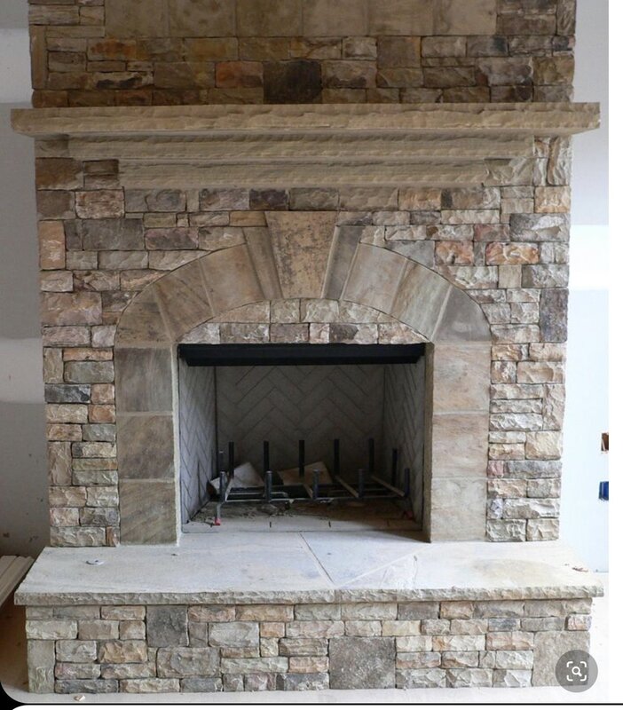 Fireplace cladding with stone