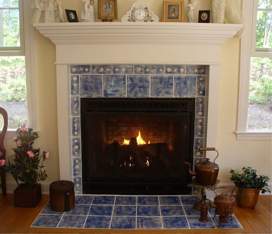 Facing the fireplace with tiles