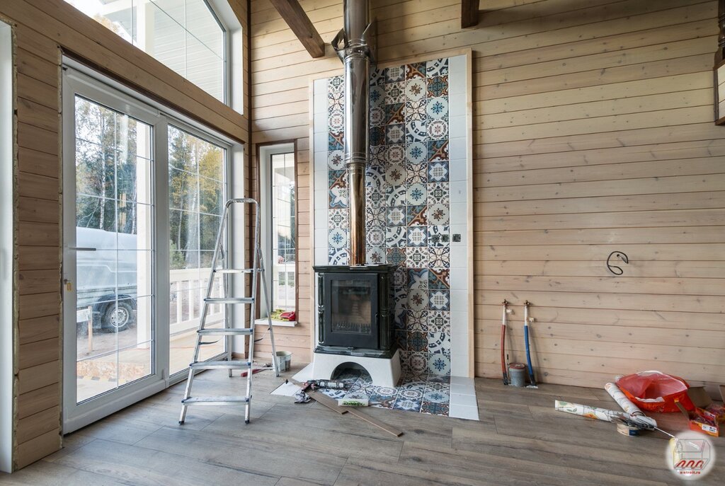 Wall cladding behind the stove fireplace 31 фото