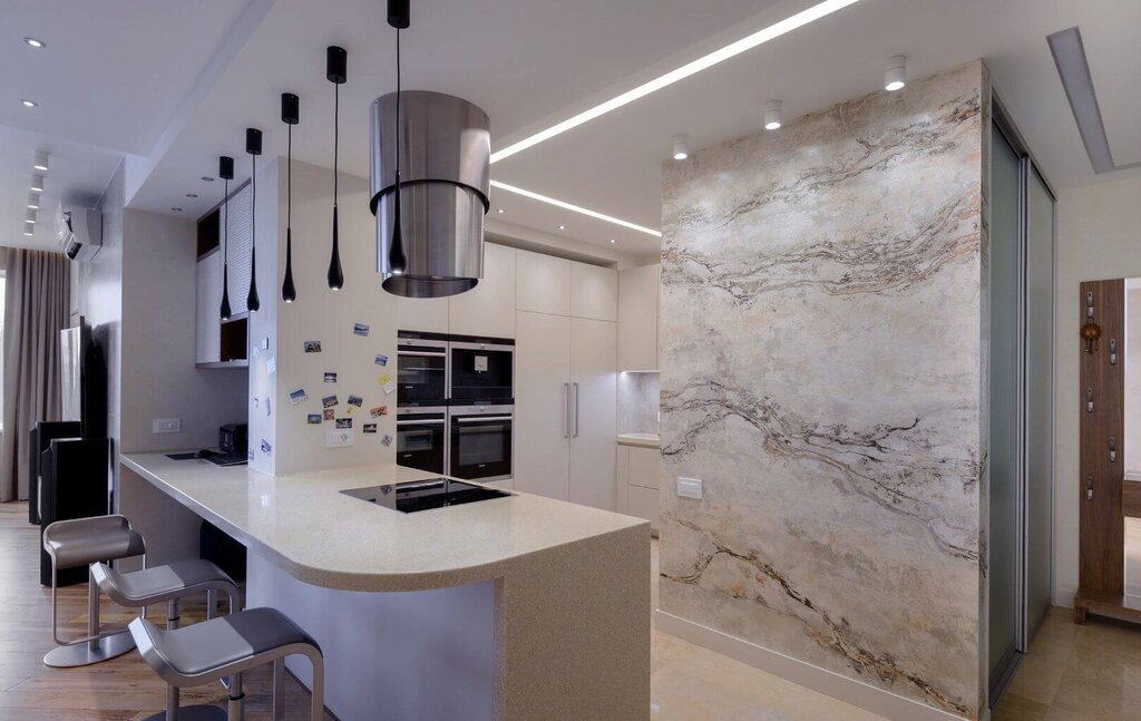 Marble-effect wallpaper in the kitchen interior