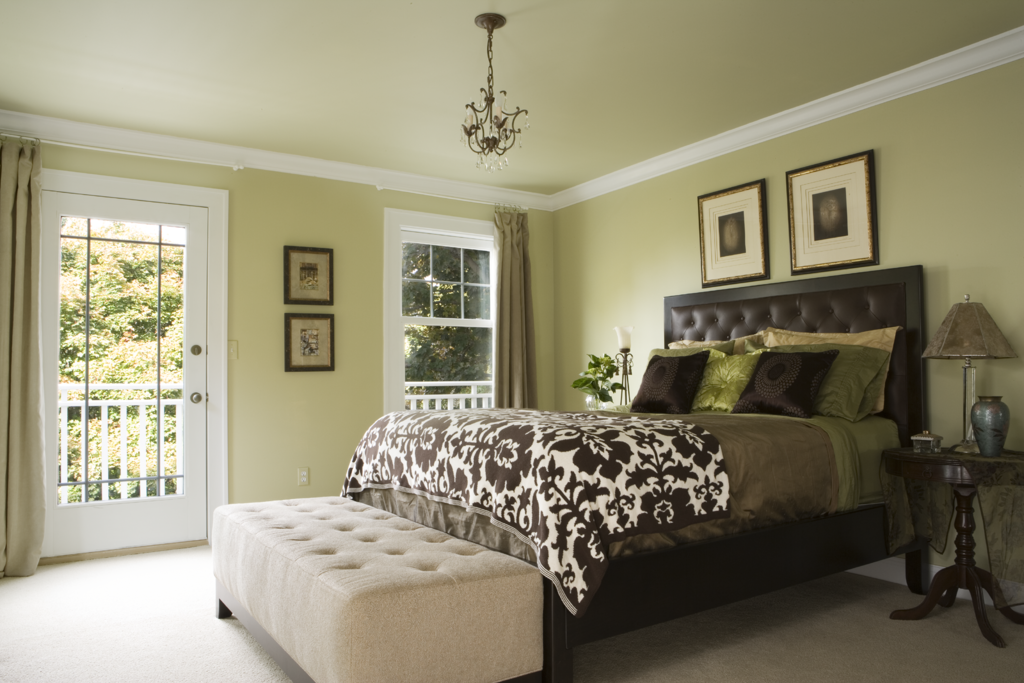 Olive-colored walls in the bedroom