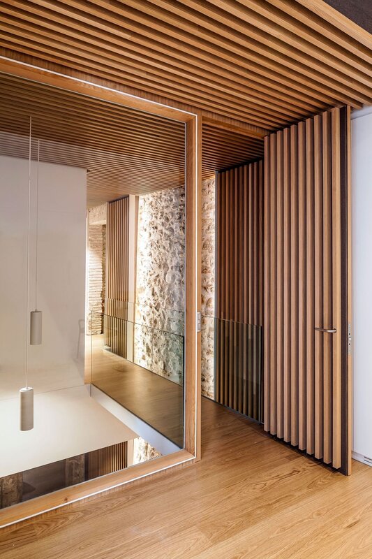 Wall cladding with wooden slats