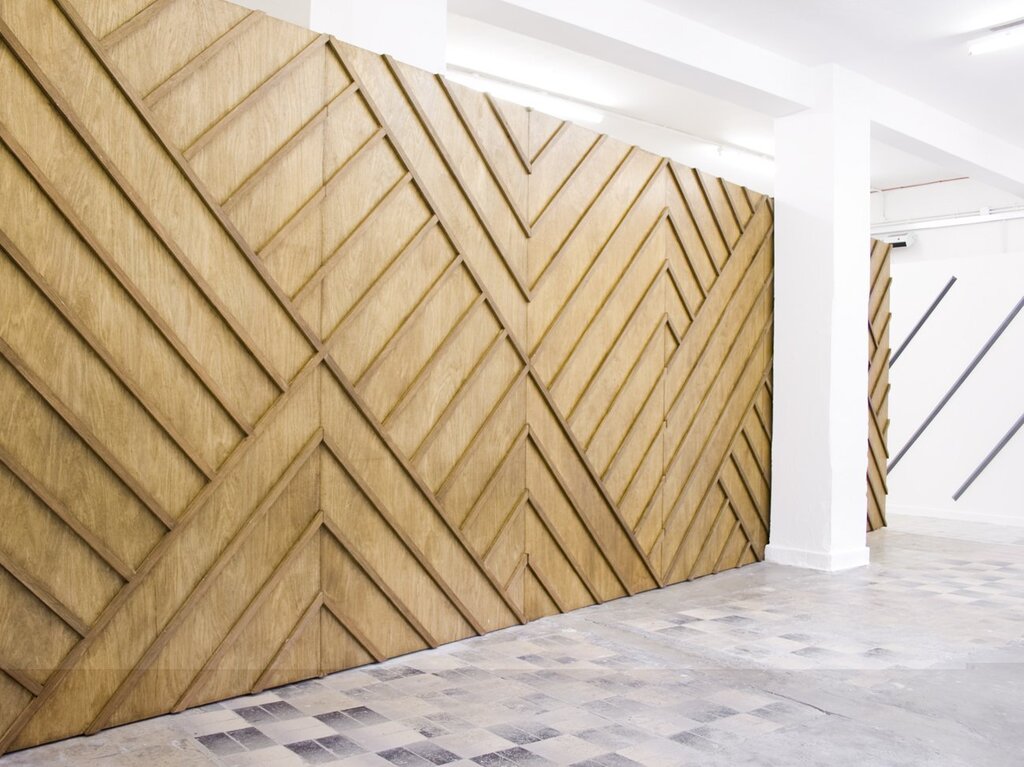 Wall cladding with wooden slats