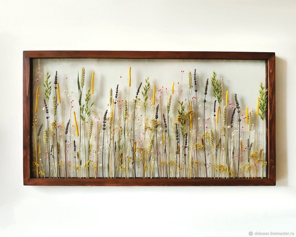 A wall panel made of dried flowers