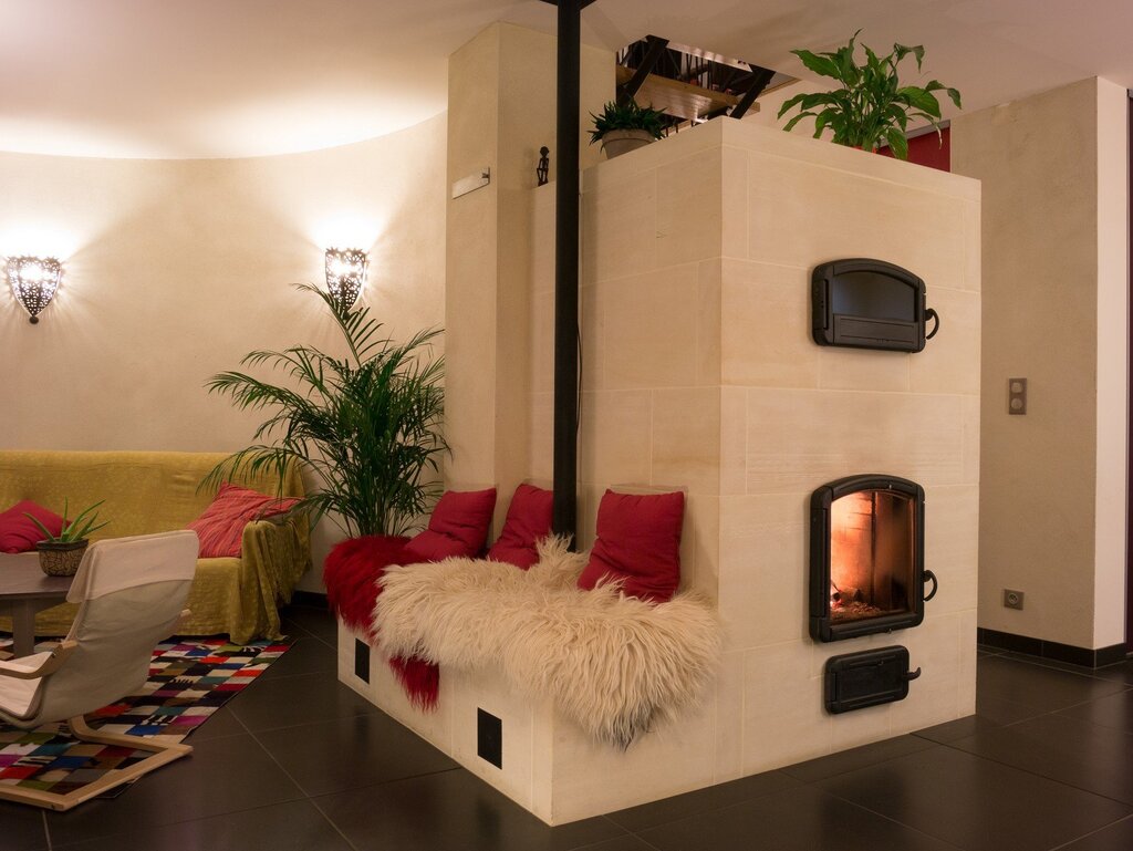 Fireplace stove with a sleeping platform