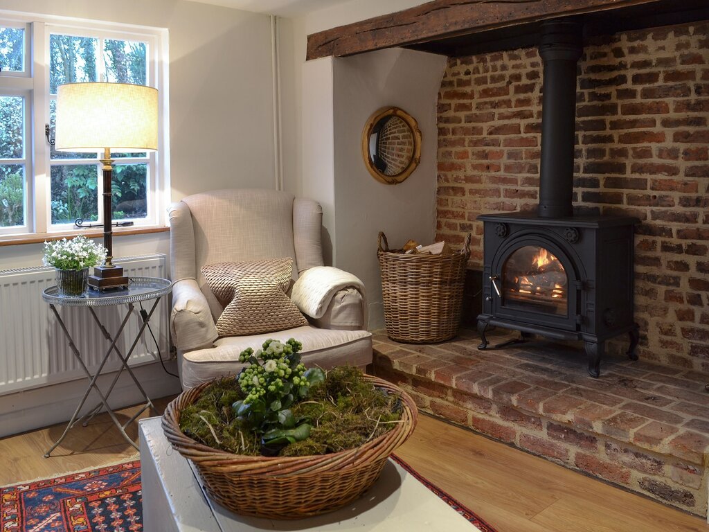 Fireplace stove in the interior of a country house