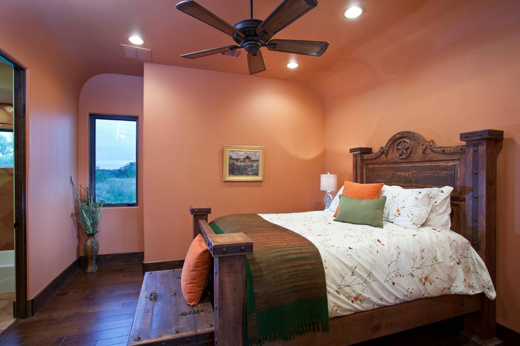 Peach-colored walls in the bedroom