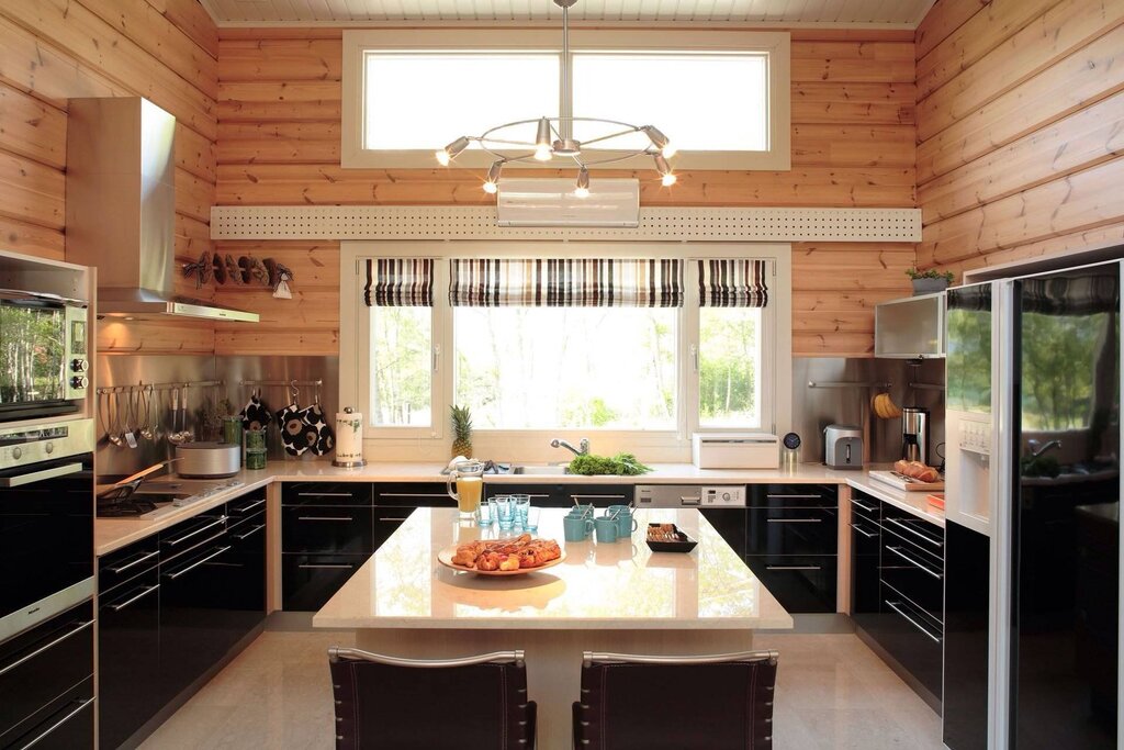 Kitchen layout at the summer house with a window