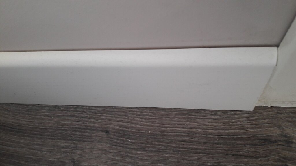 Baseboard for uneven walls