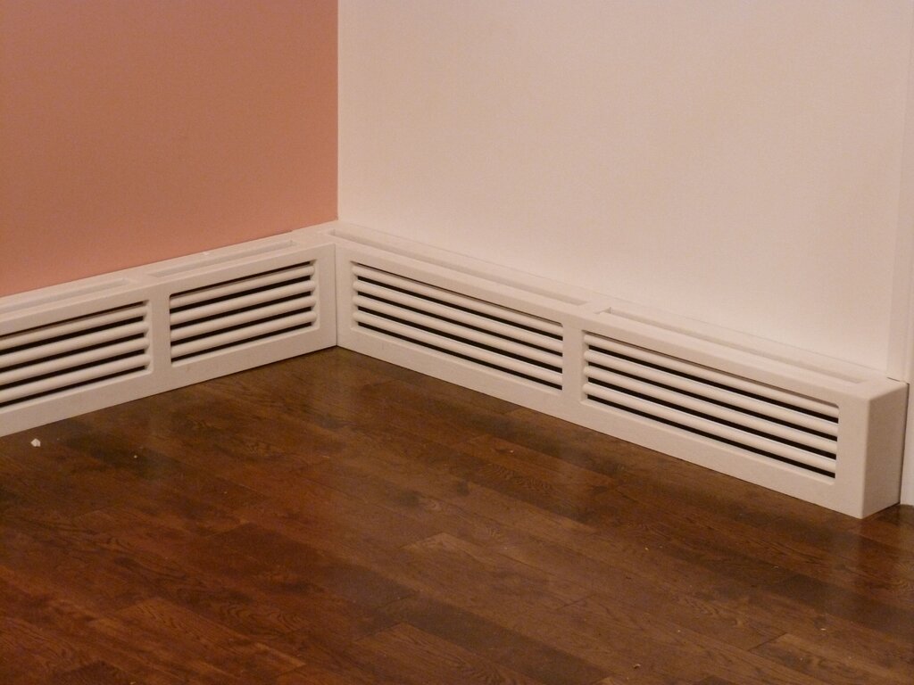 Baseboard for heating pipe