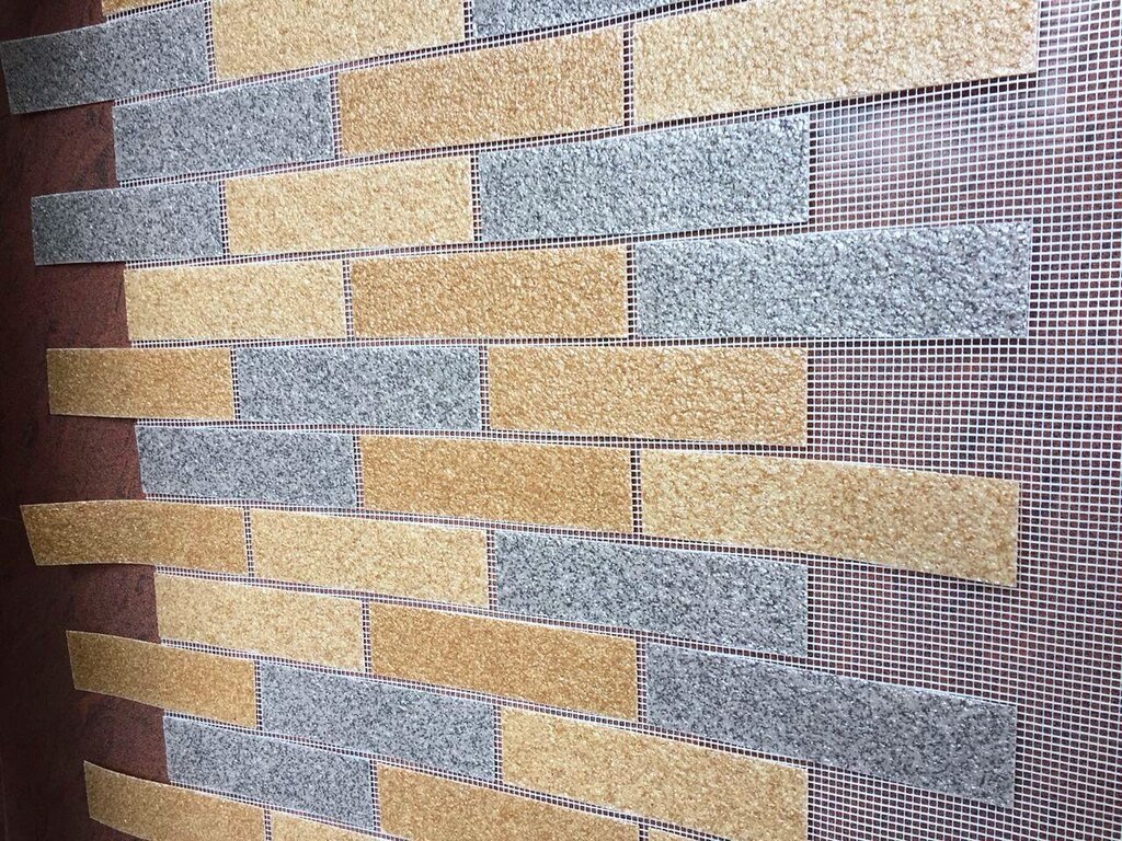 Tile on mesh for facade