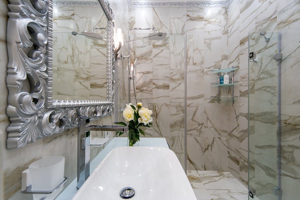 Marble-look tile in a small bathroom