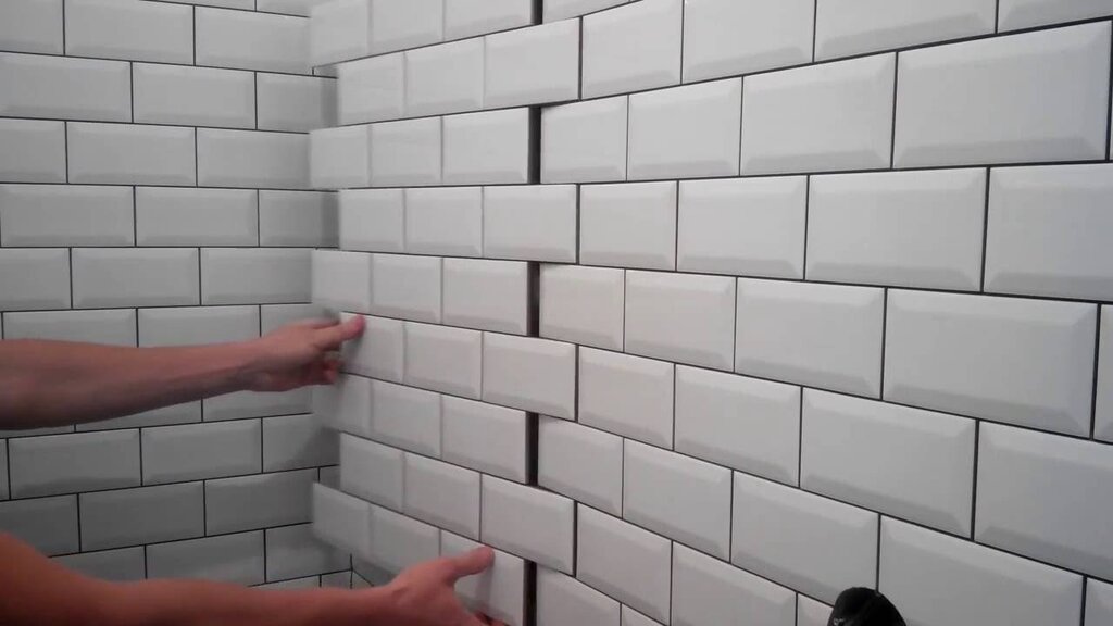 Tile in a staggered pattern on the wall