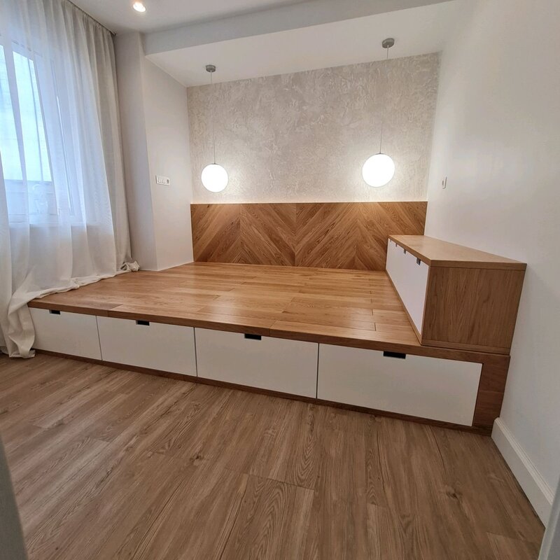 A podium with pull-out drawers in the apartment