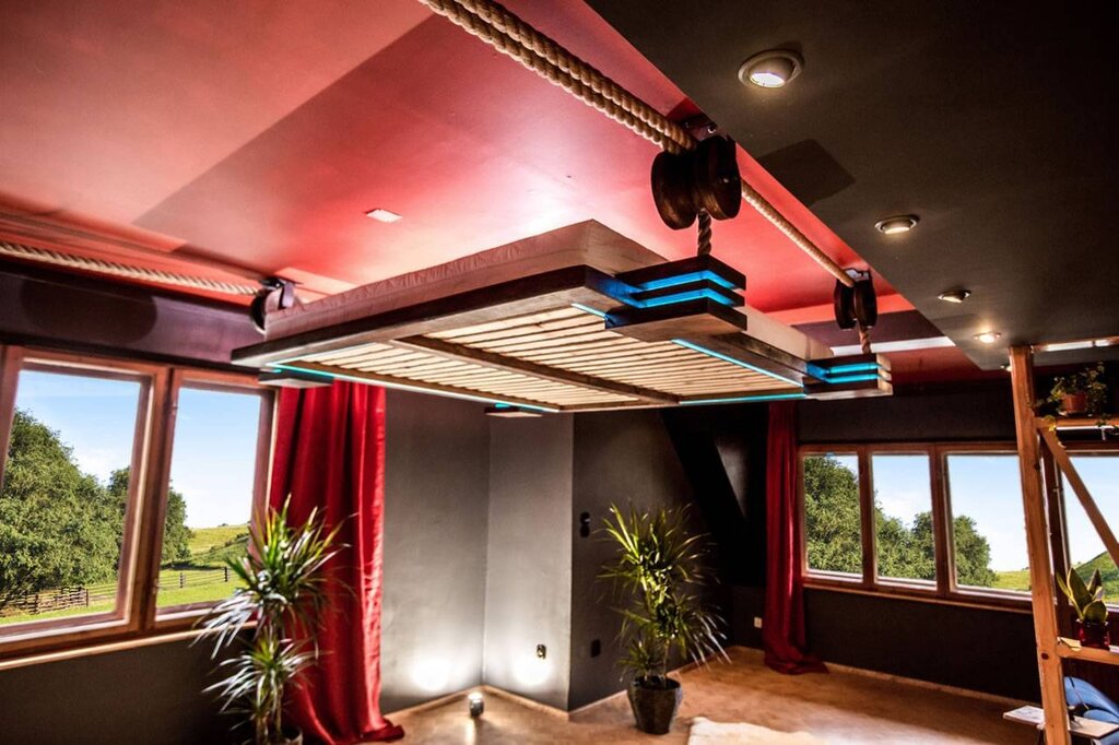 A hanging bed under the ceiling