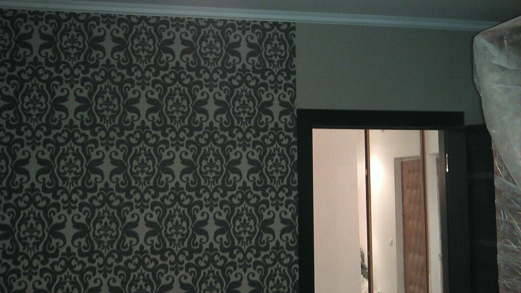 Wallpapering in a door frame