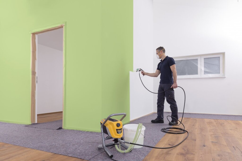 Painting walls with a spray gun