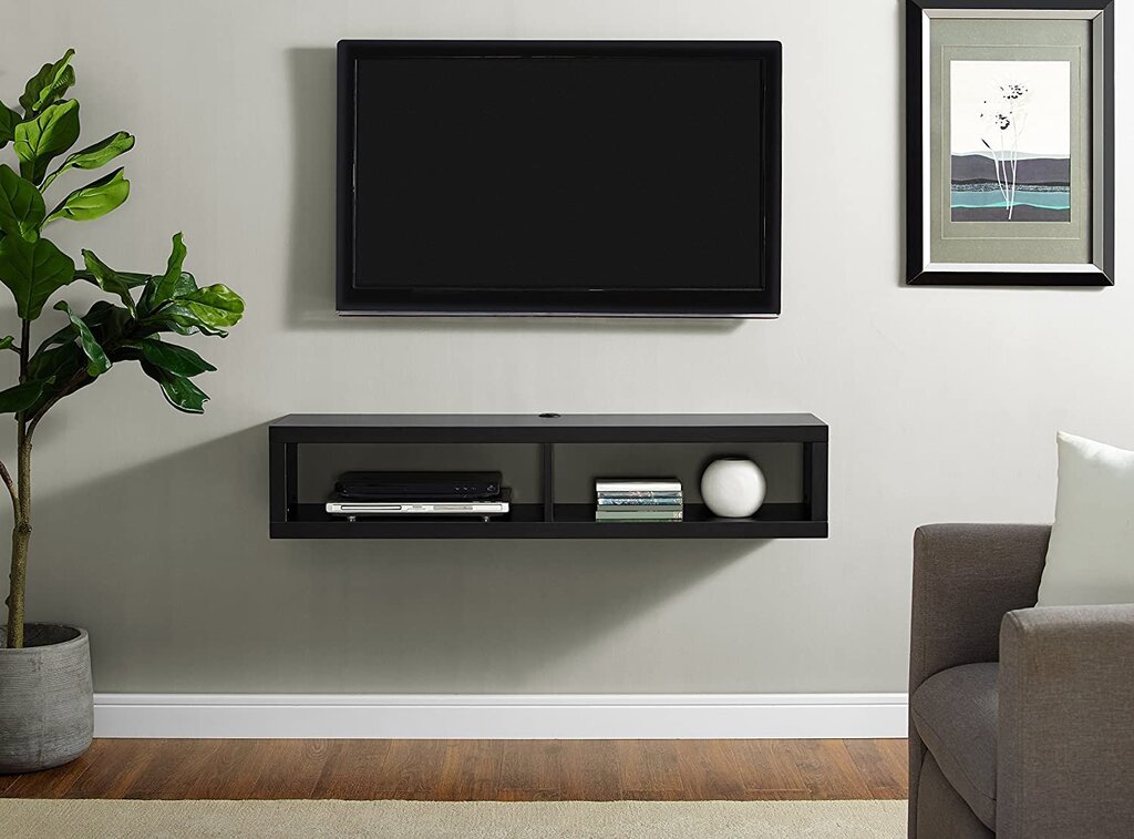 A shelf for a TV on the wall