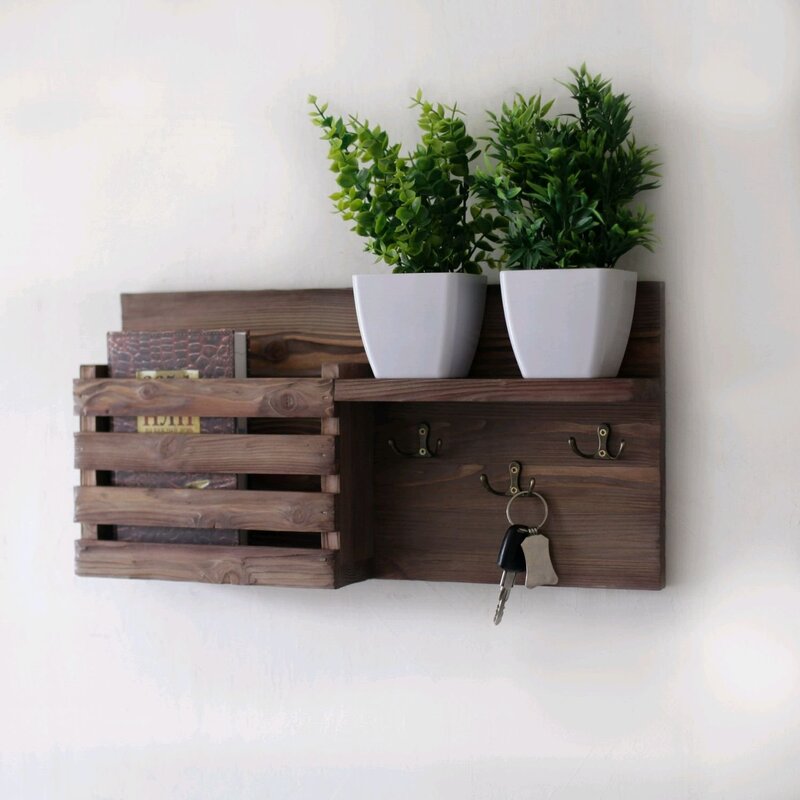 A shelf in the hallway for small items