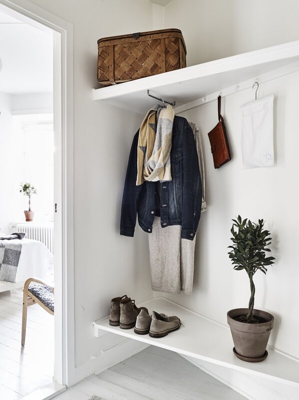 A shelf for the hallway on the wall