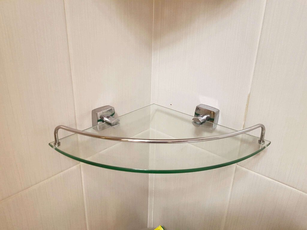 Glass corner shelf for the bathroom