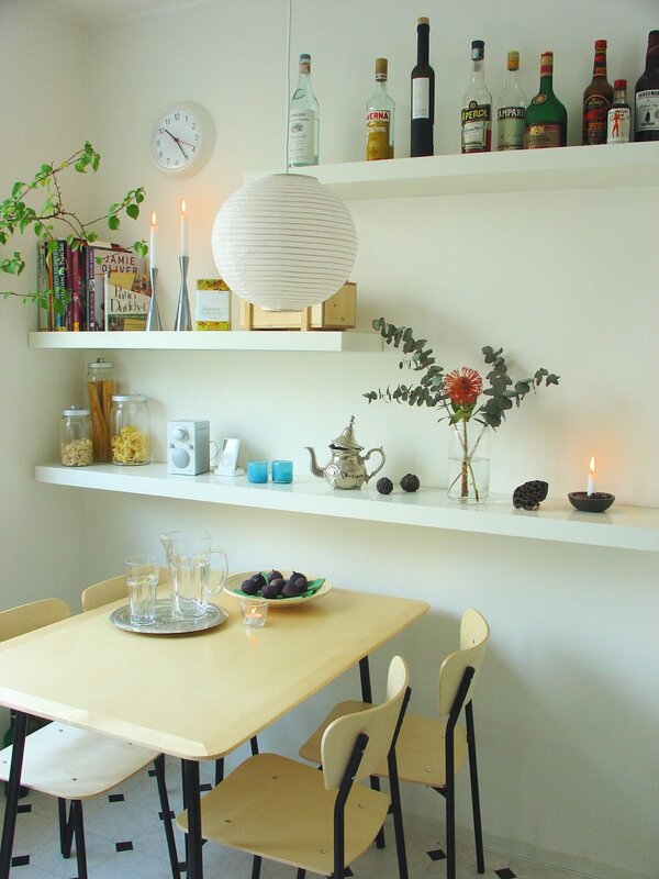 Shelves above the kitchen table