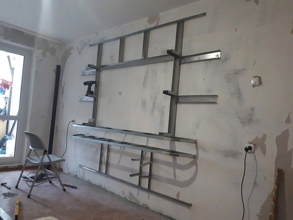 Shelves made of drywall on the wall