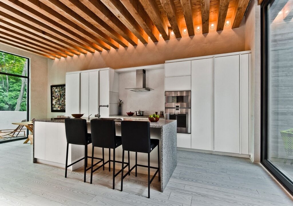 The ceiling is wooden slatted in a modern style