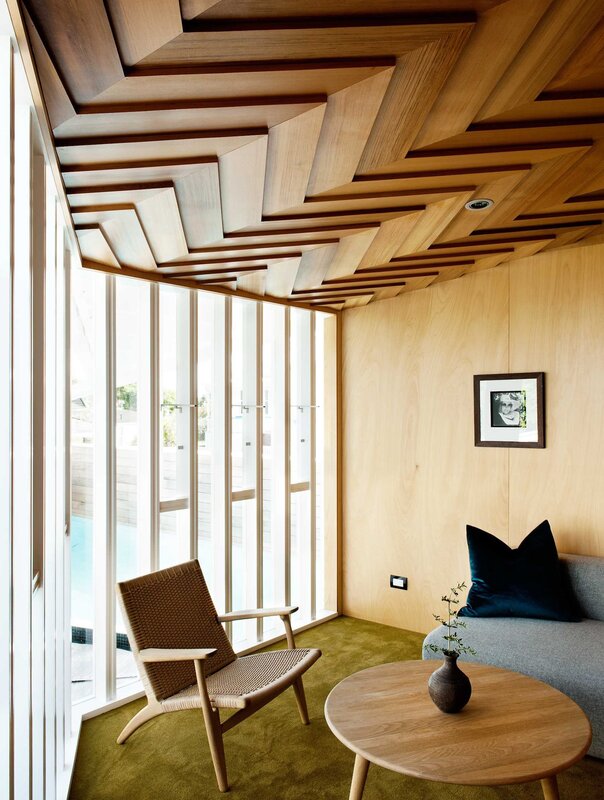 Plywood ceiling in a wooden house