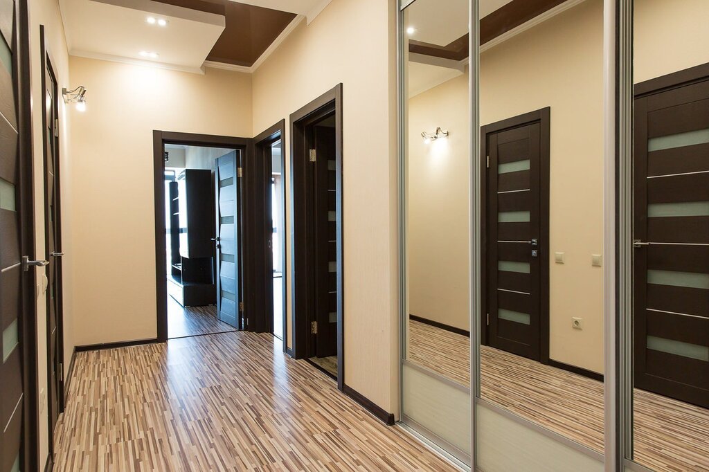 Entrance hall with a dark floor