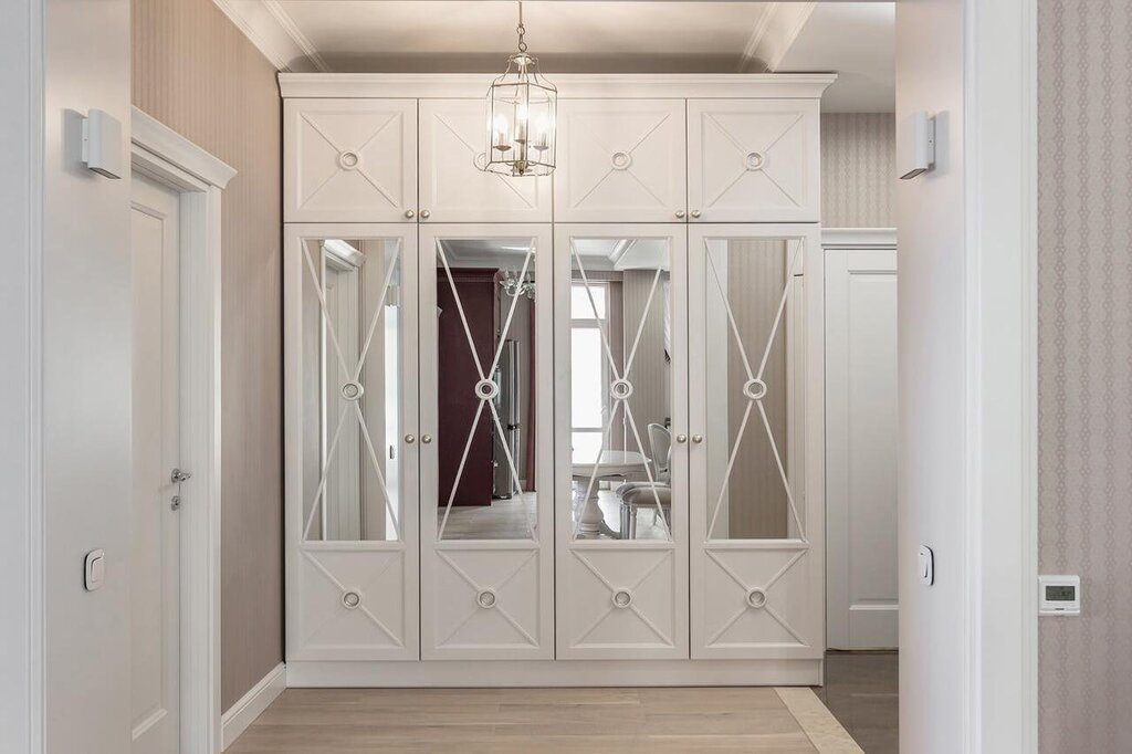 A swing door wardrobe with a mirror for the hallway