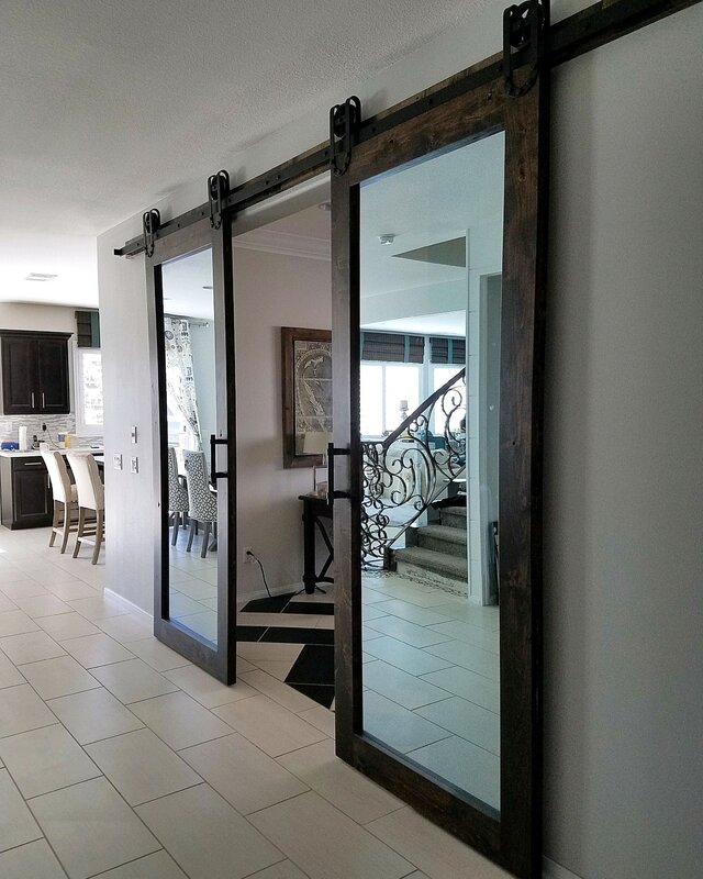 Sliding mirror doors