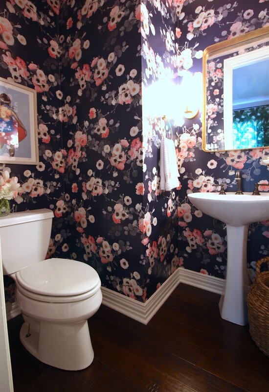 Repair in the toilet with wallpaper