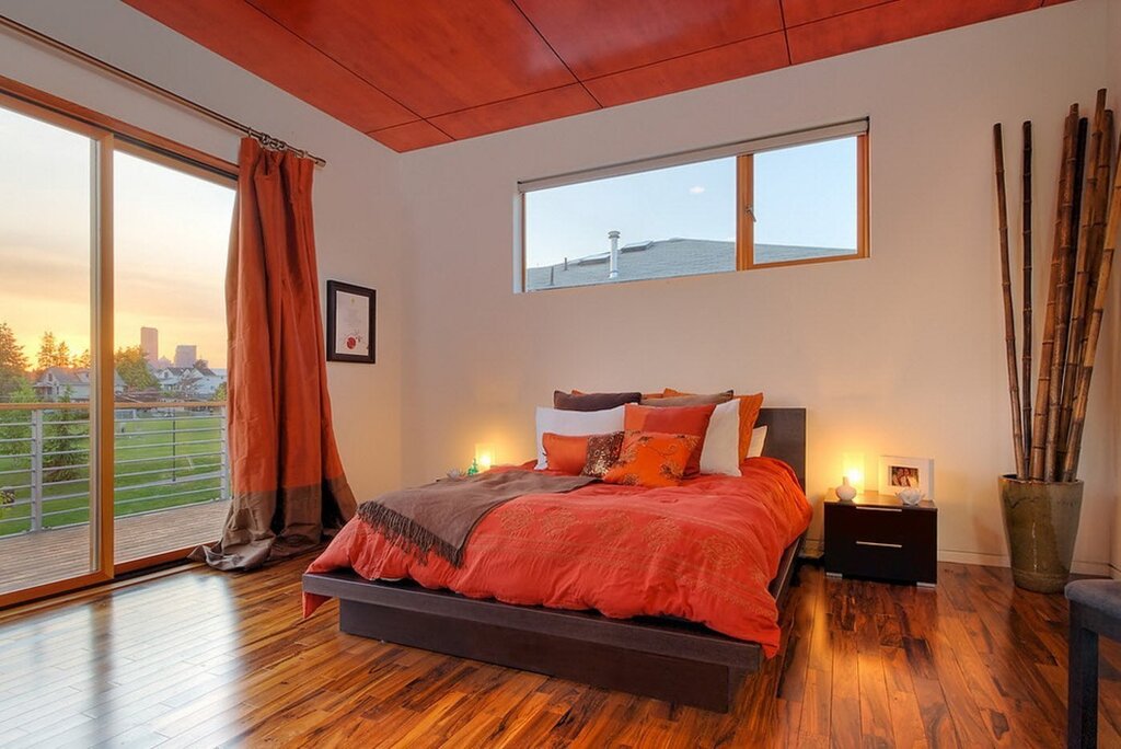 Orange furniture in the bedroom interior