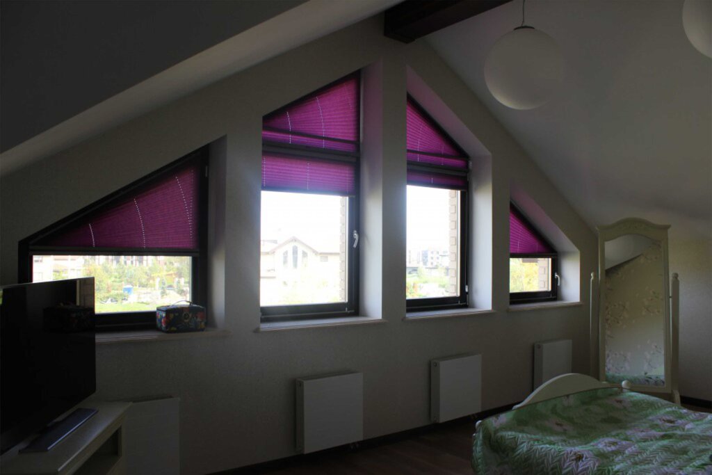 Roller blinds for slanted windows