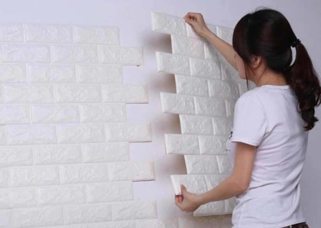 Self-adhesive wall blocks