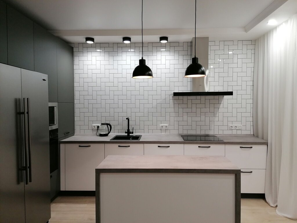 Gray kitchen without upper cabinets